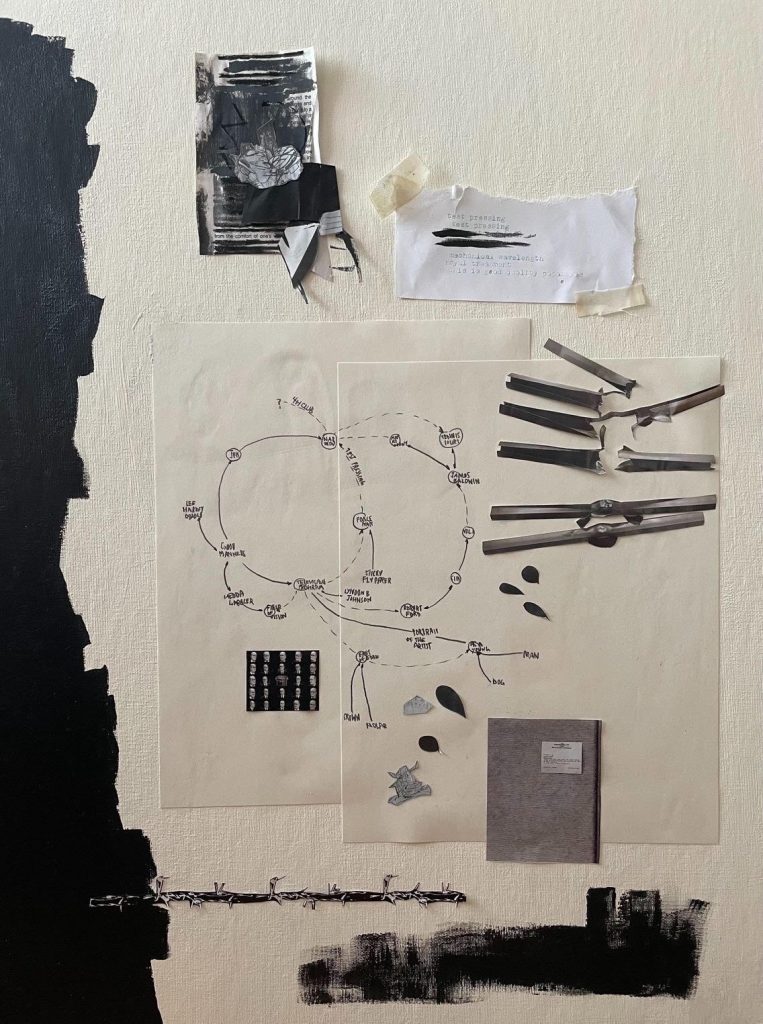 painting black white text tape wire newspaper