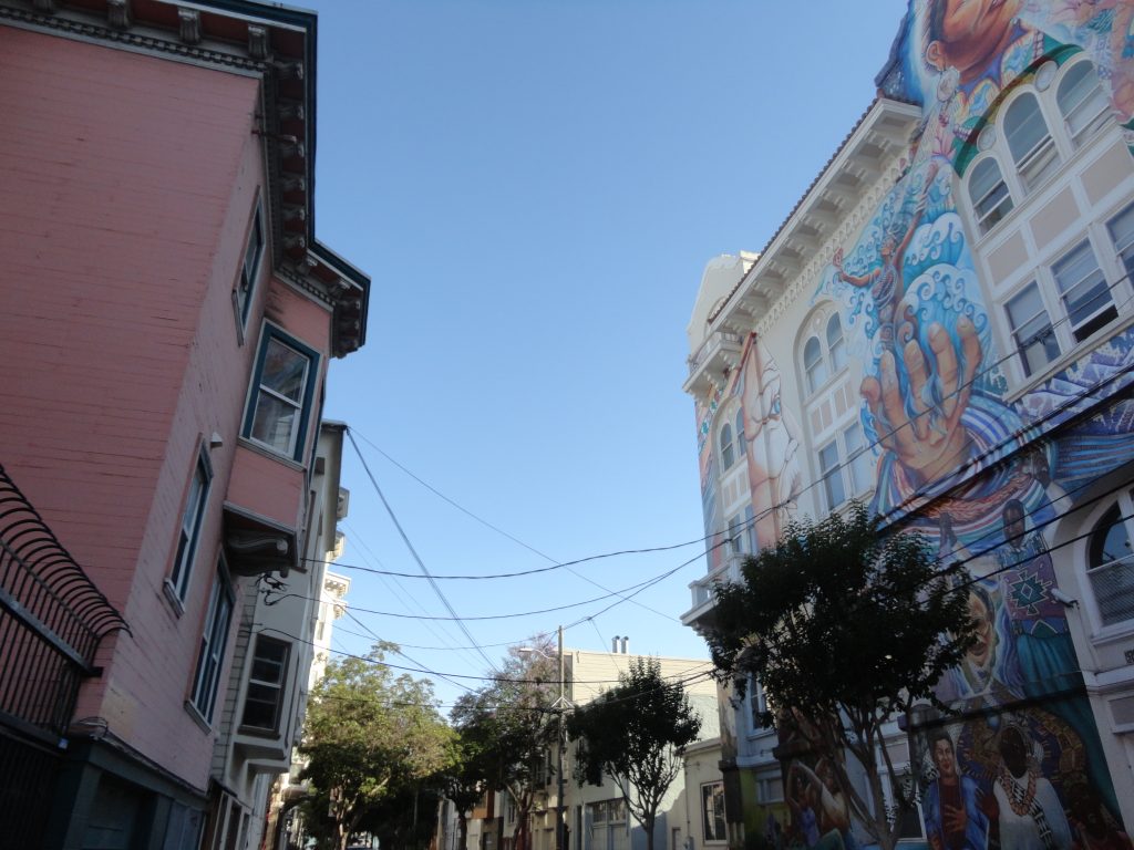 buildings murals pink sky